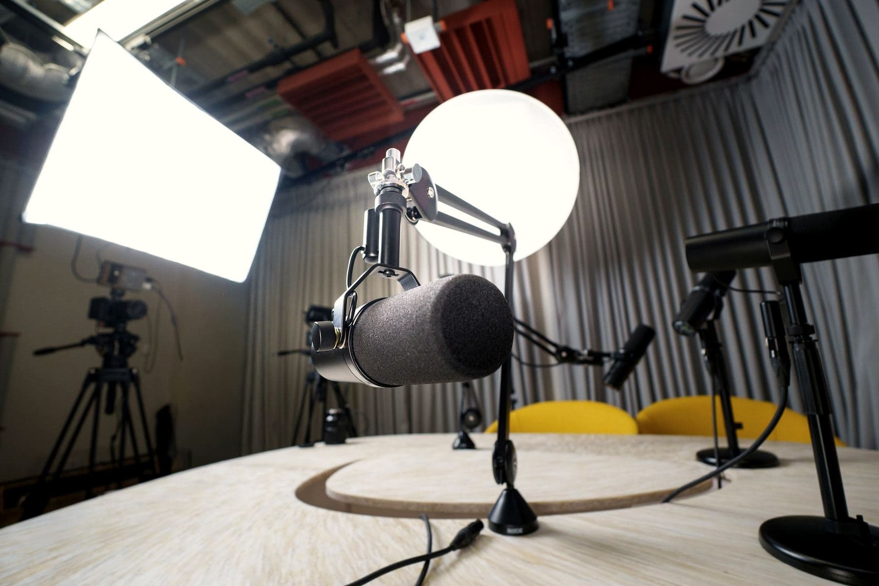Podcast recording set with microphones and cameras